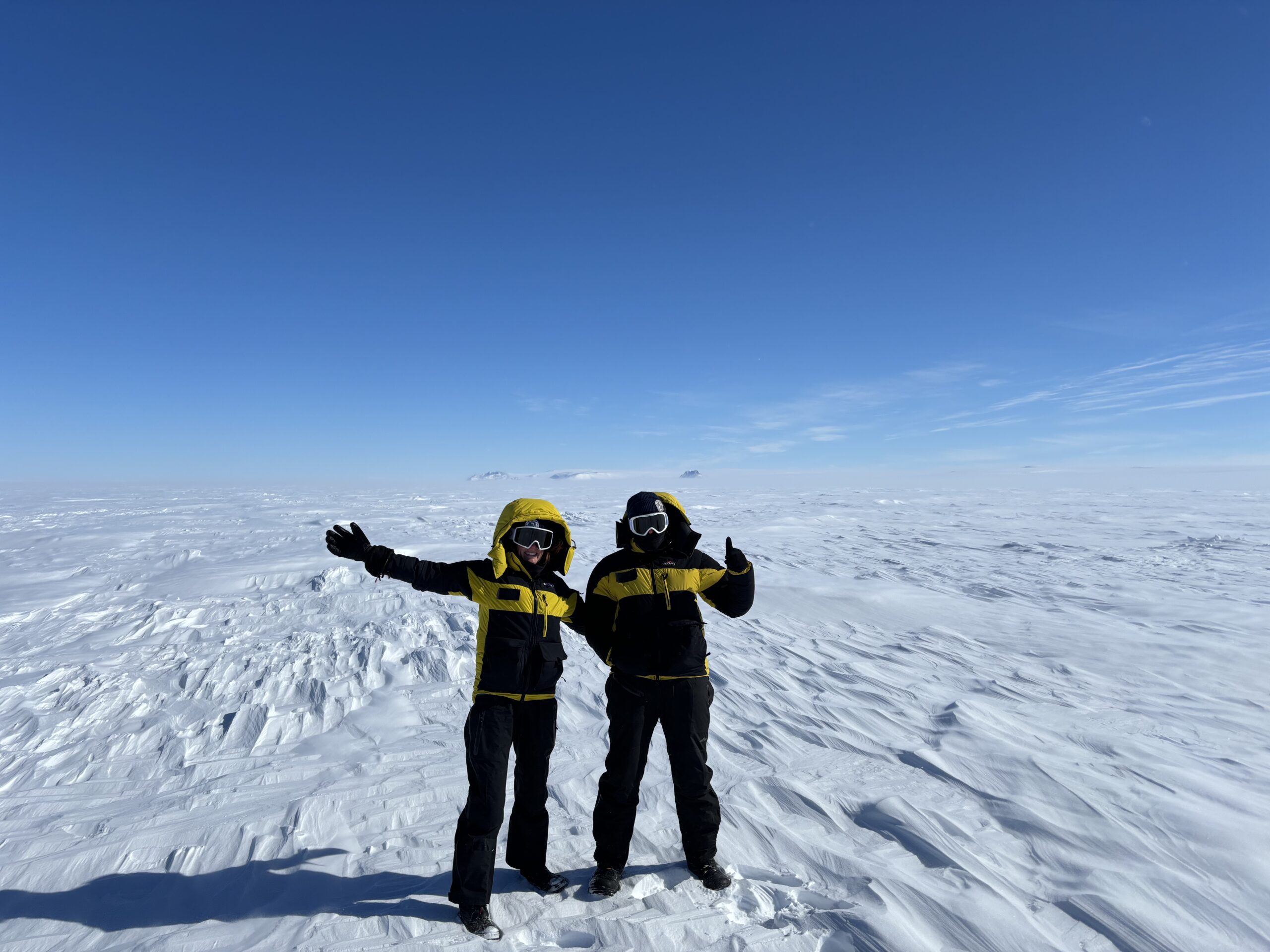 Researchers standing on the Denman Glacier as part of the Denman Terrestrial Campaign