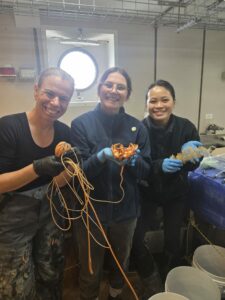 Prof. Jan Strugnell, Dr. Kat Prata and Dr. Sally Lau from James Cook University and Securing Antarctica’s Environmental Future (SAEF) the benthic animal team on the COOKIES voyage. Image credit: S. Jessop.