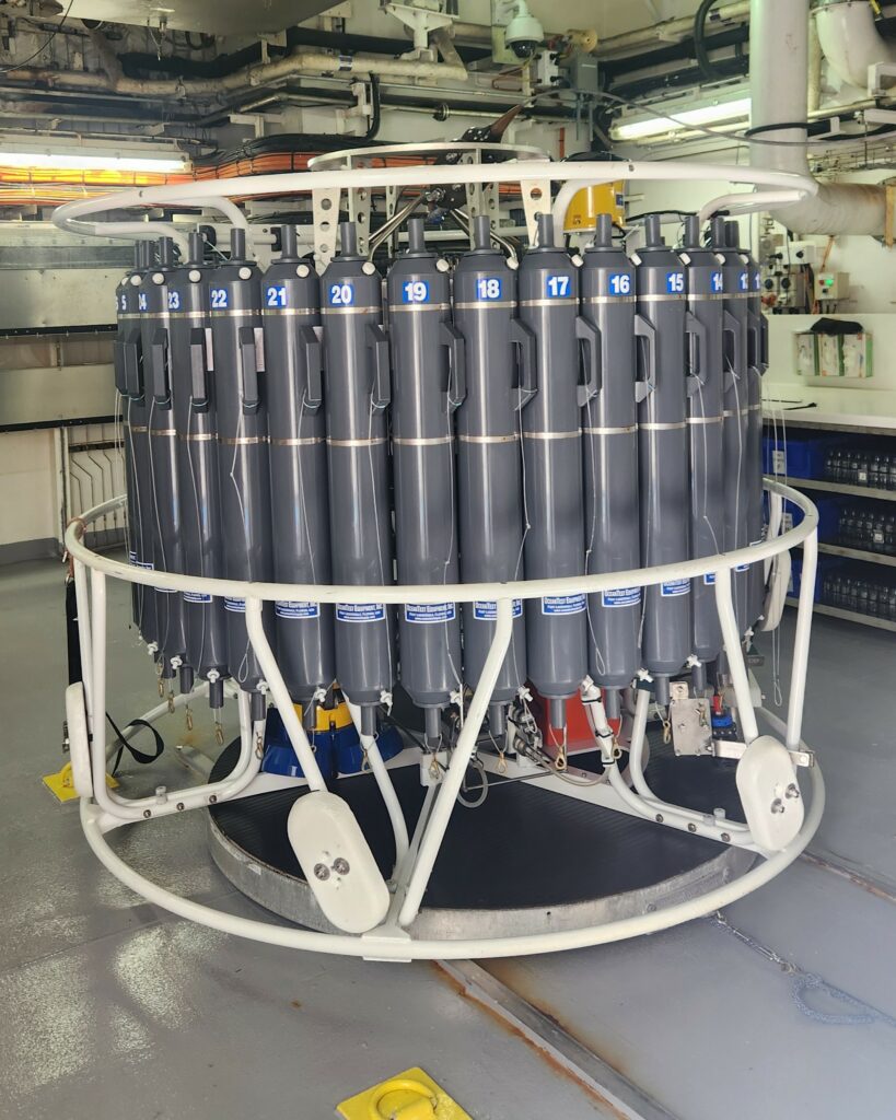 A CTD after it has been deployed – ready to be sampled by scientists. Each bottle/Niskin has been closed at a specific depth. Credit: Joline Lalime.