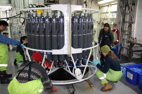 AM Science team taking CTD/Niskin water samples. Image credit: J. Lalime.
