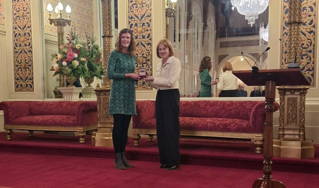 Dr Jacqueline Halpin receiving her award from the Royal Society of Tasmania.