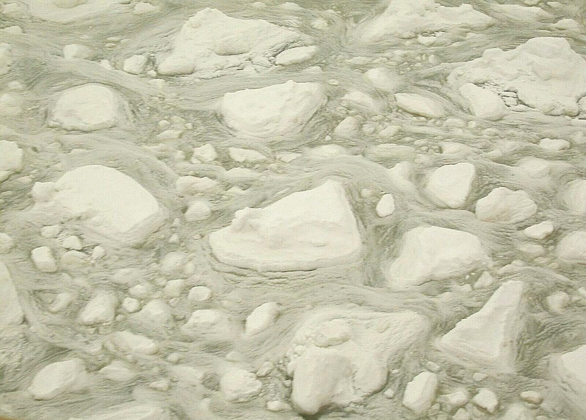 Waves cause ice floes to grind together and pulverise, forming a slush that promotes greening by sea-ice algae. Photo: Rob Massom.