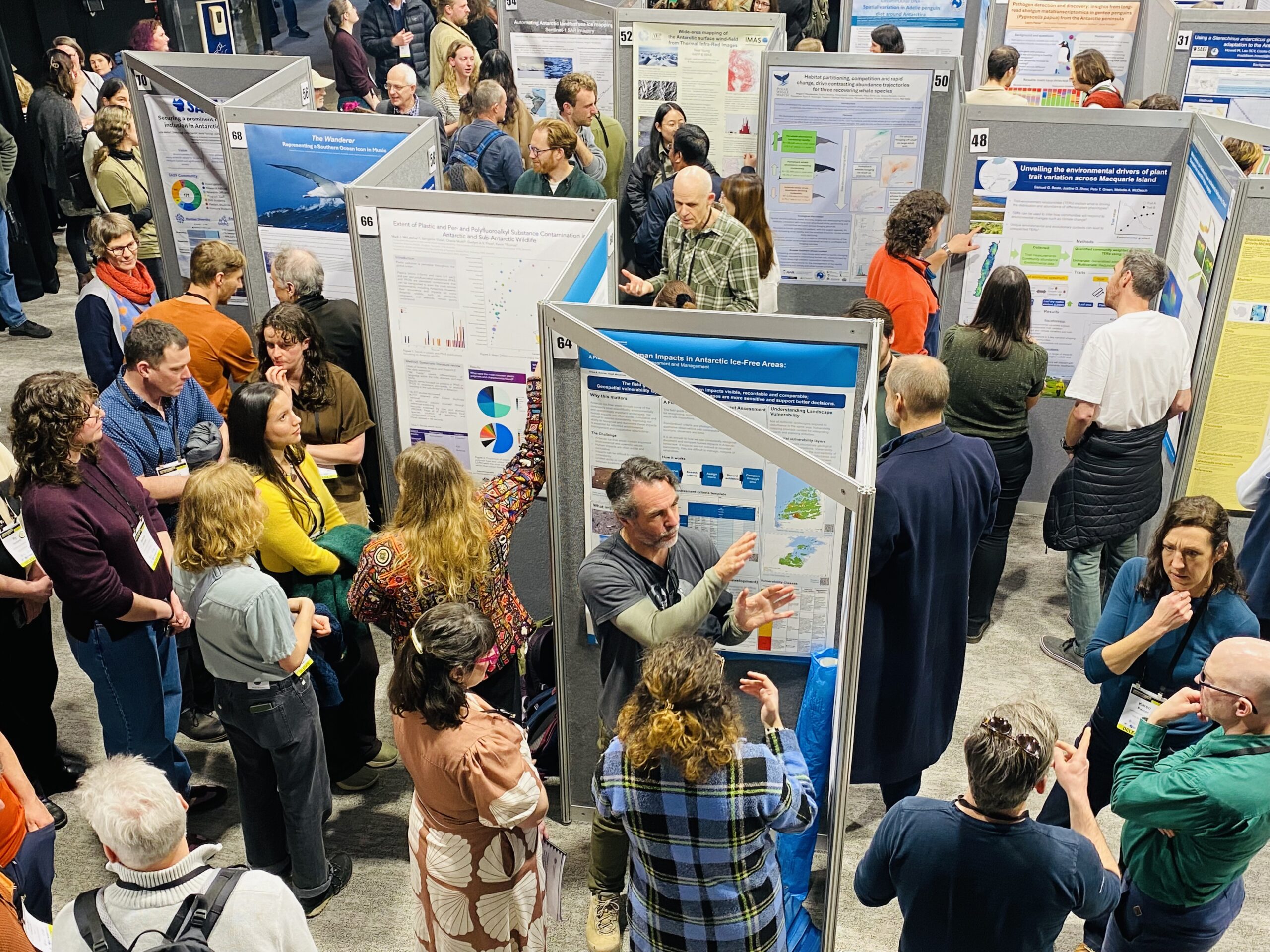 Researchers presenting science posters at the Antarctic Research Conference (AARC) held at the University of Tasmania. Credit: Grace Moss