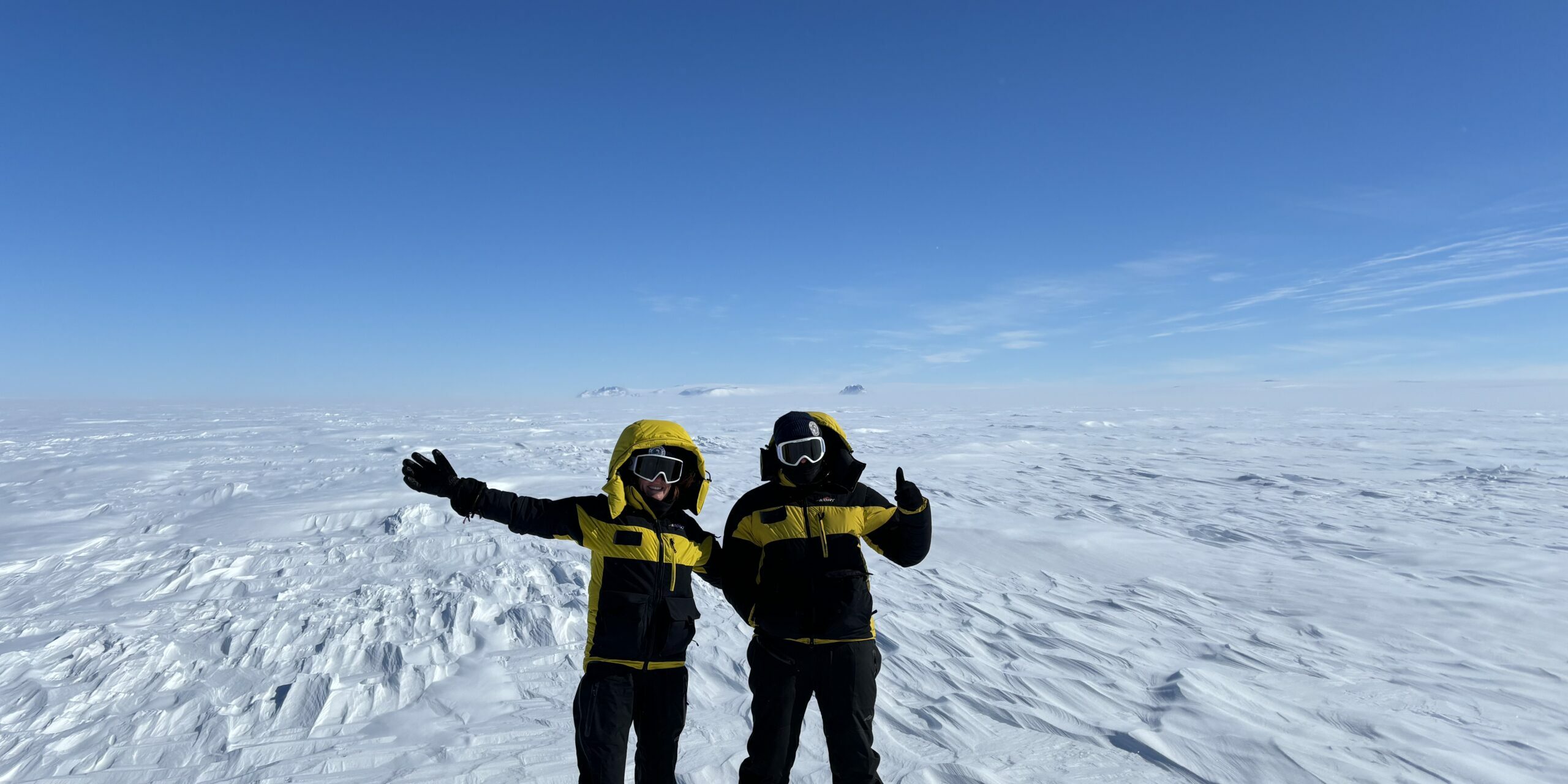 Researchers standing on the Denman Glacier as part of the Denman Terrestrial Campaign