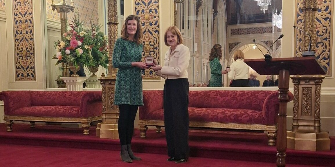 Dr Jacqueline Halpin receiving her award from the Royal Society of Tasmania.